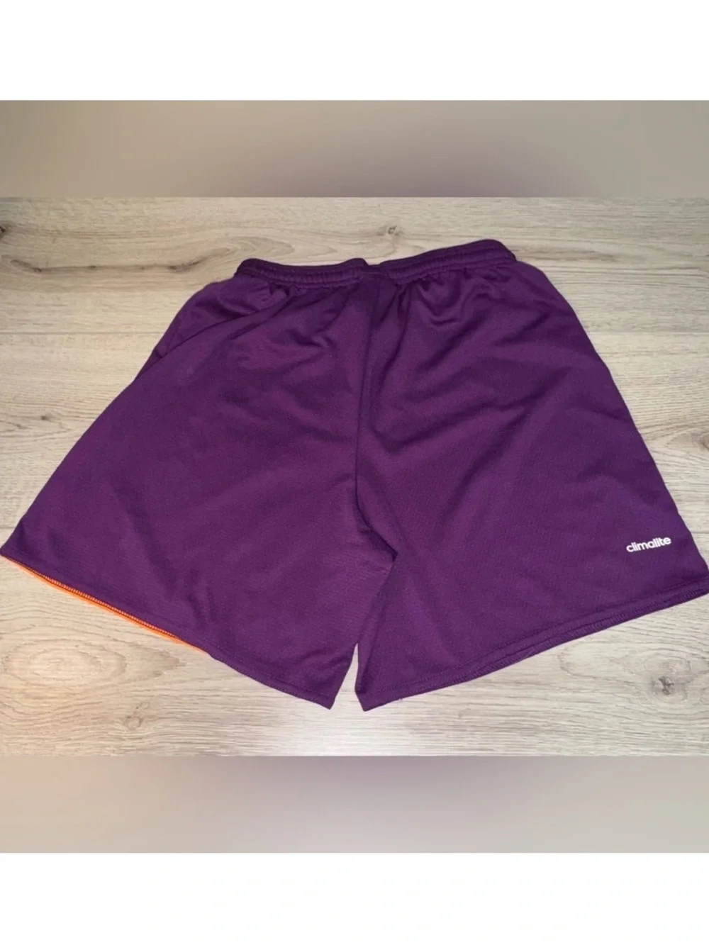 adidas Women’s Purple Athletic Shorts with Orange Accent - Picture 2 of 3